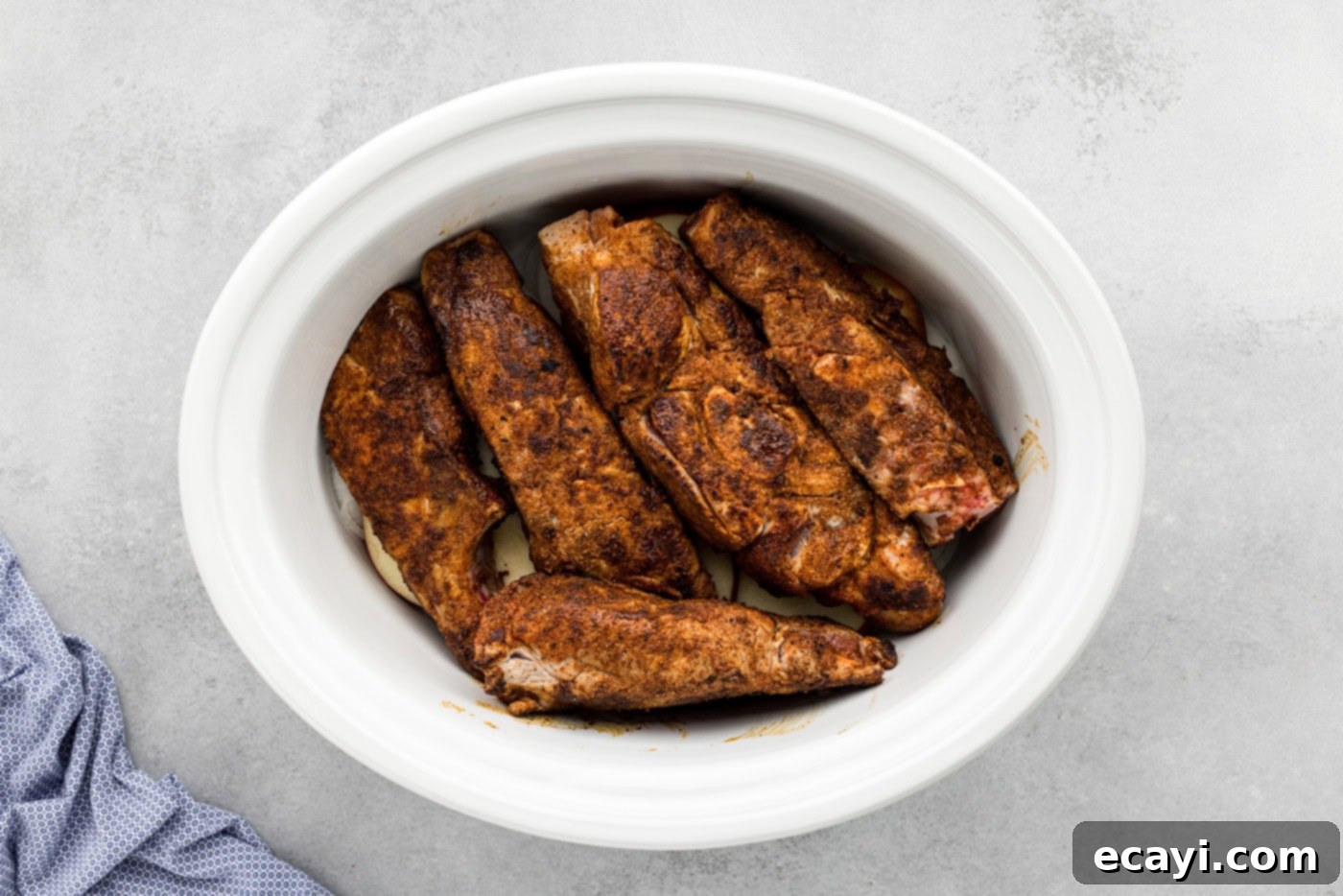 Fall-Off-The-Bone Slow Cooker BBQ Country Ribs 9 country style ribs in a crockpot