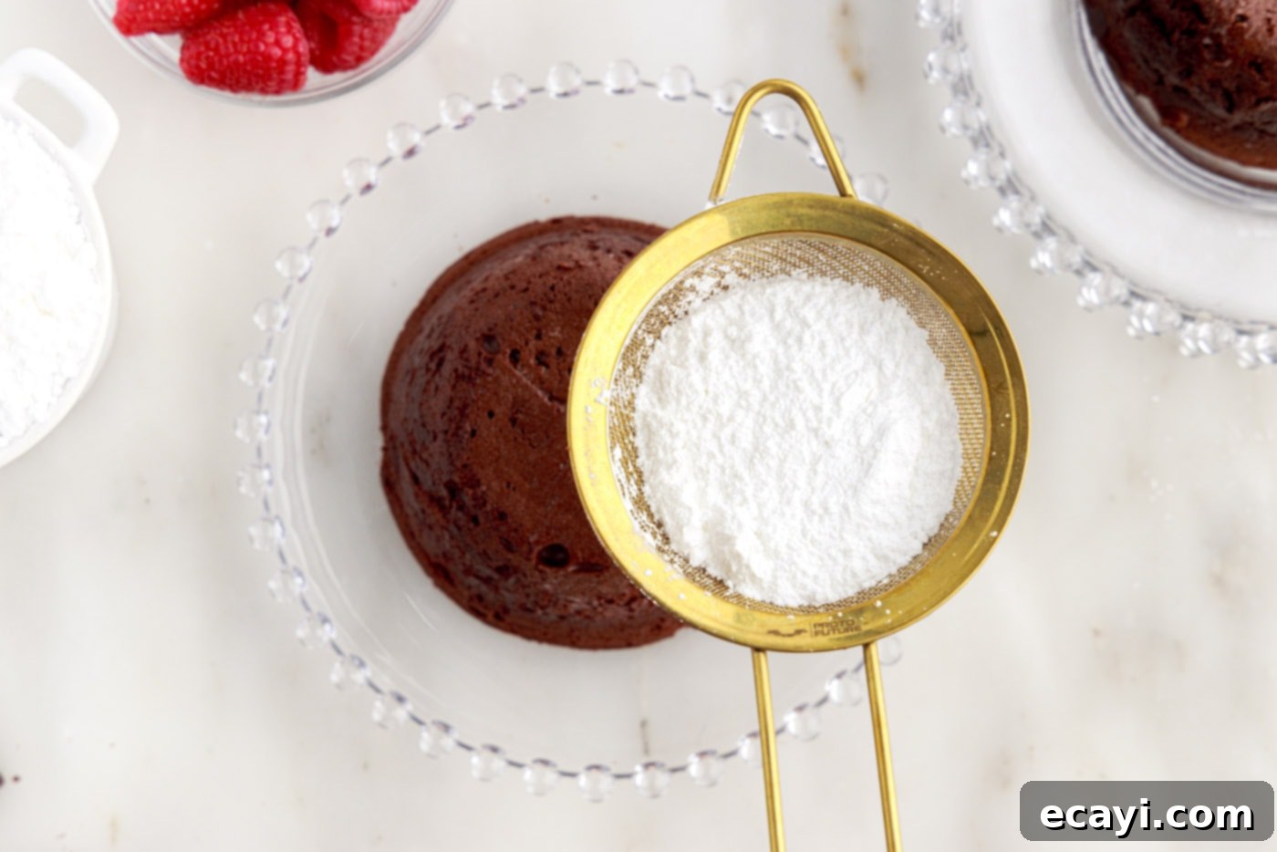 Molten Chocolate Bliss 18 dusting lava cake with powdered sugar