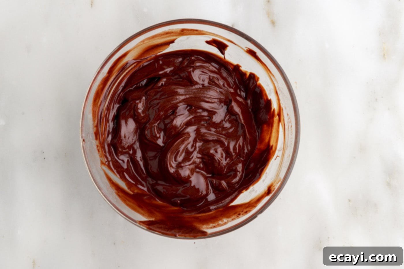 Molten Chocolate Bliss 6 melted butter and chocolate mixed in a bowl