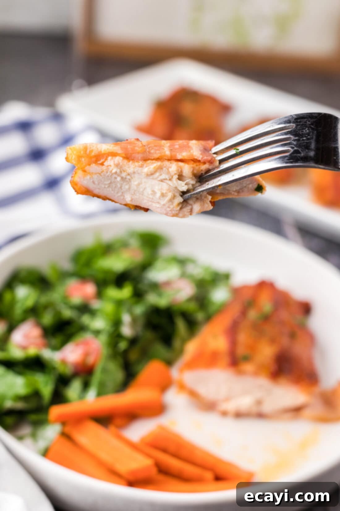 Crispy Bacon-Wrapped Chicken 11 Piece of Bacon Wrapped Chicken on a fork
