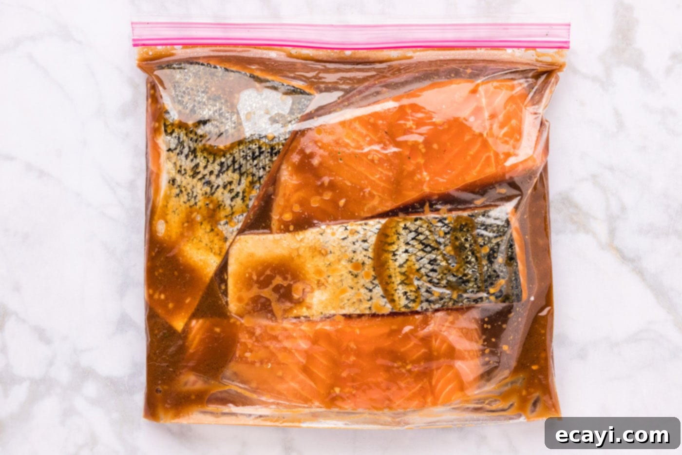 Sweet & Savory Teriyaki Salmon 6 marinating salmon in teriyaki sauce