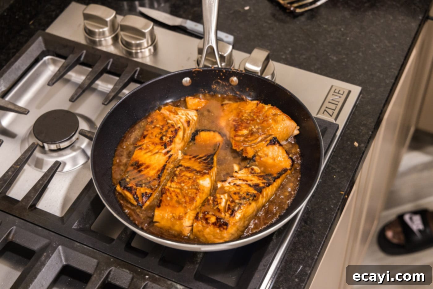 Sweet & Savory Teriyaki Salmon 9 cooked teriyaki salmon in a skillet