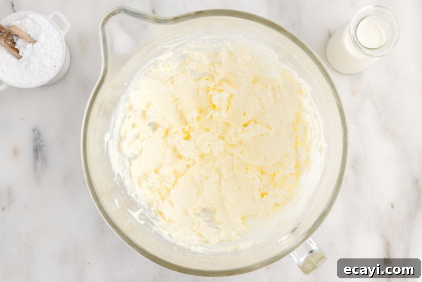 Pineapple Coconut Paradise 17 mixed cream cheese and butter in a bowl, light and creamy