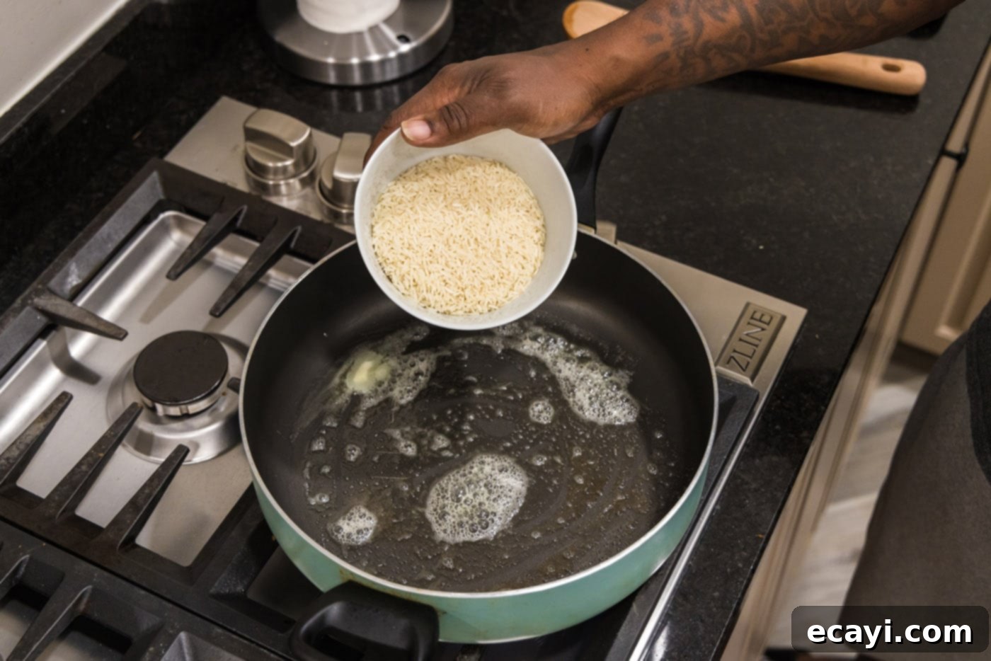 Savory Pilaf Perfection 5 adding rice to skillet with chicken stock