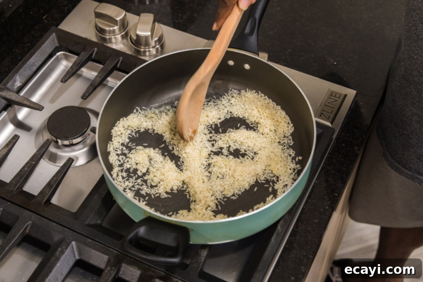 Savory Pilaf Perfection 6 browning white rice in a skillet with butter