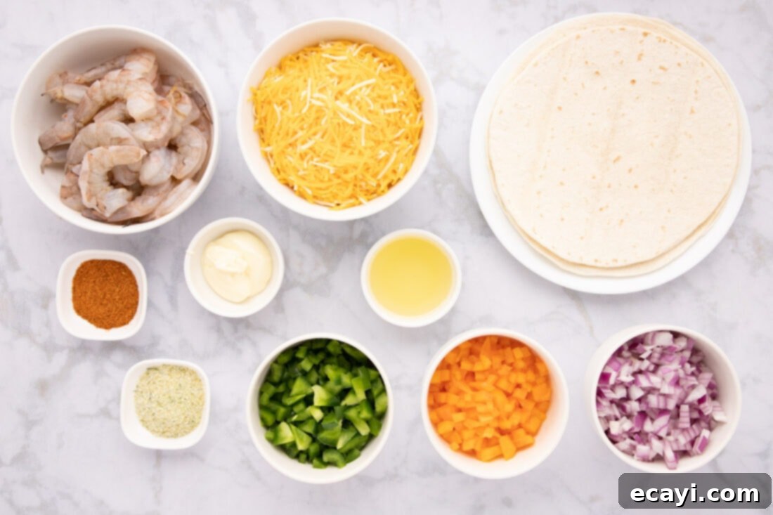 Zesty Shrimp Quesadilla 4 A colorful array of ingredients laid out on a counter, including shrimp, cheese, bell peppers, onions, and tortillas.