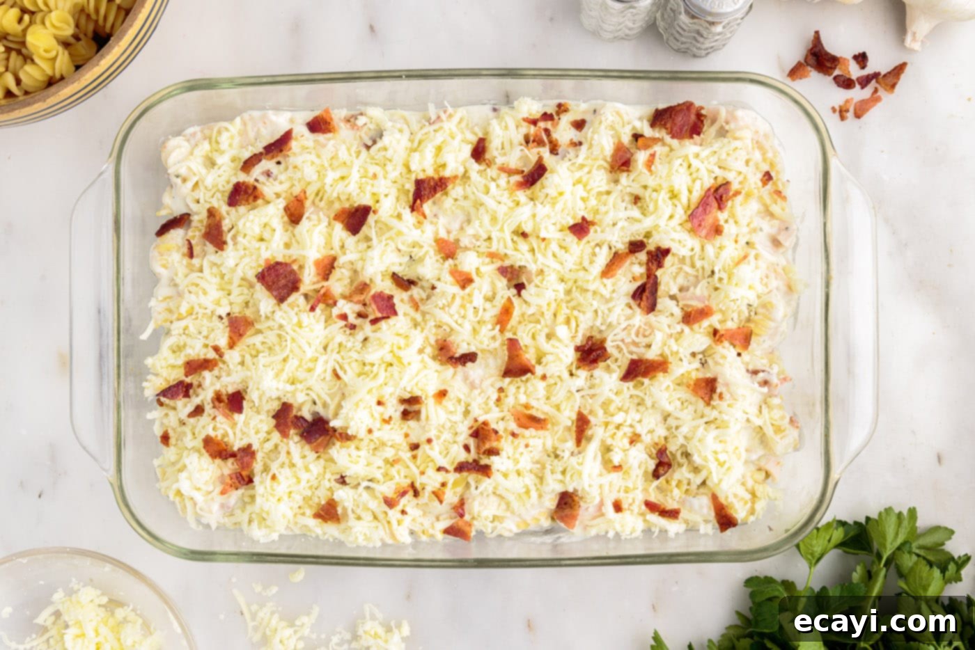 Creamy Chicken Bacon Ranch Bake 12 crumbled bacon on top of cream cheese and chicken pasta casserole
