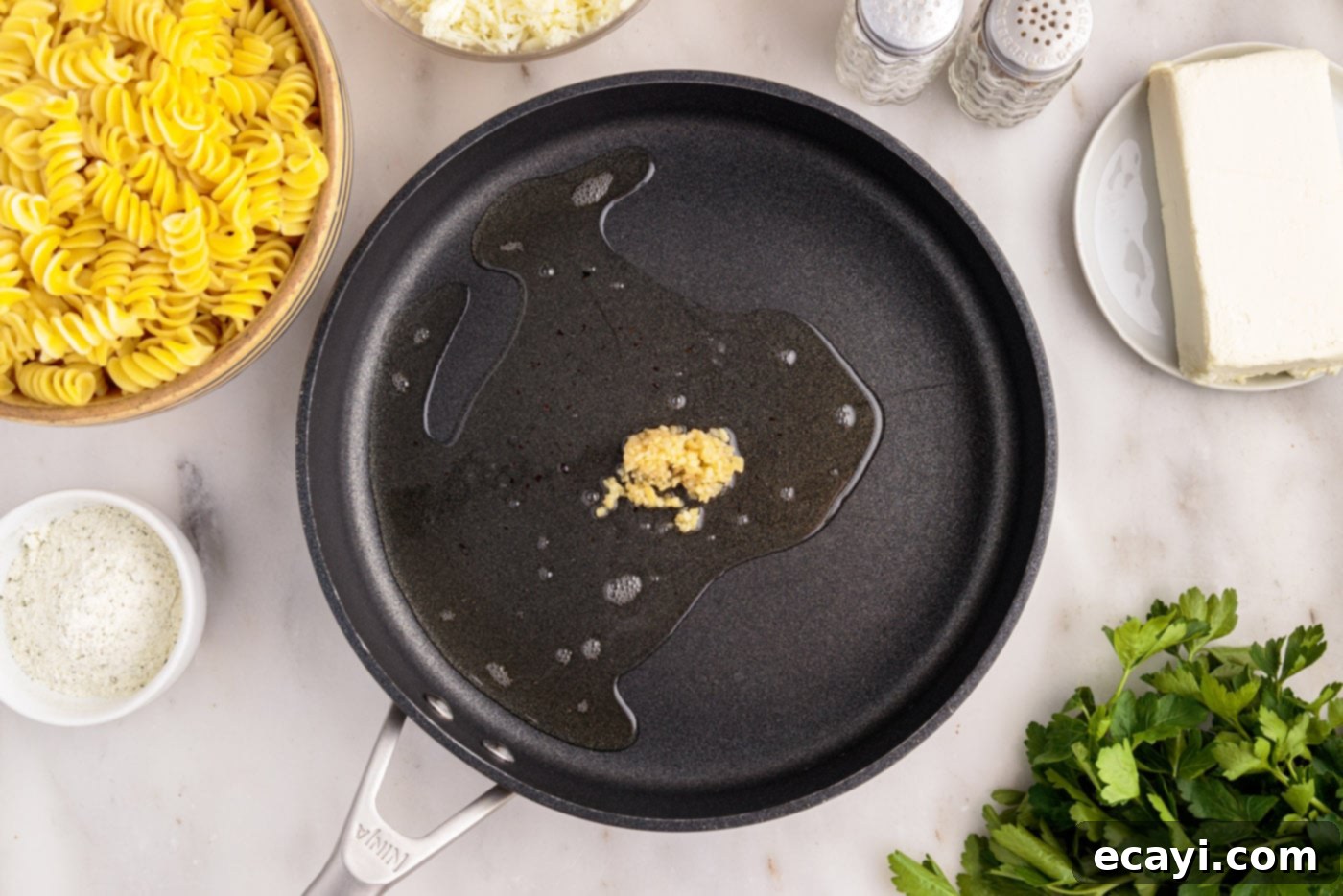 Creamy Chicken Bacon Ranch Bake 5 minced garlic sauteed in a skillet of oil
