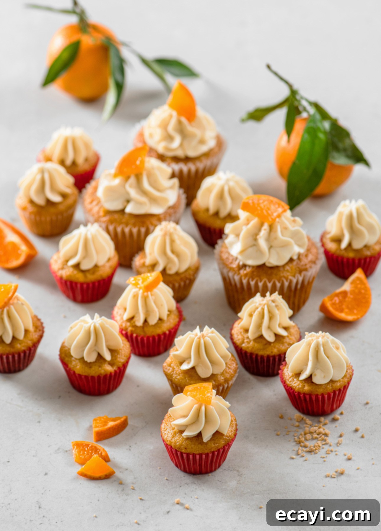 Zesty Clementine Squash Cupcakes, Topped with Dreamy Maple Meringue 2 Clementine Squash Cupcakes with Maple Italian Meringue Buttercream // FoodNouveau.com