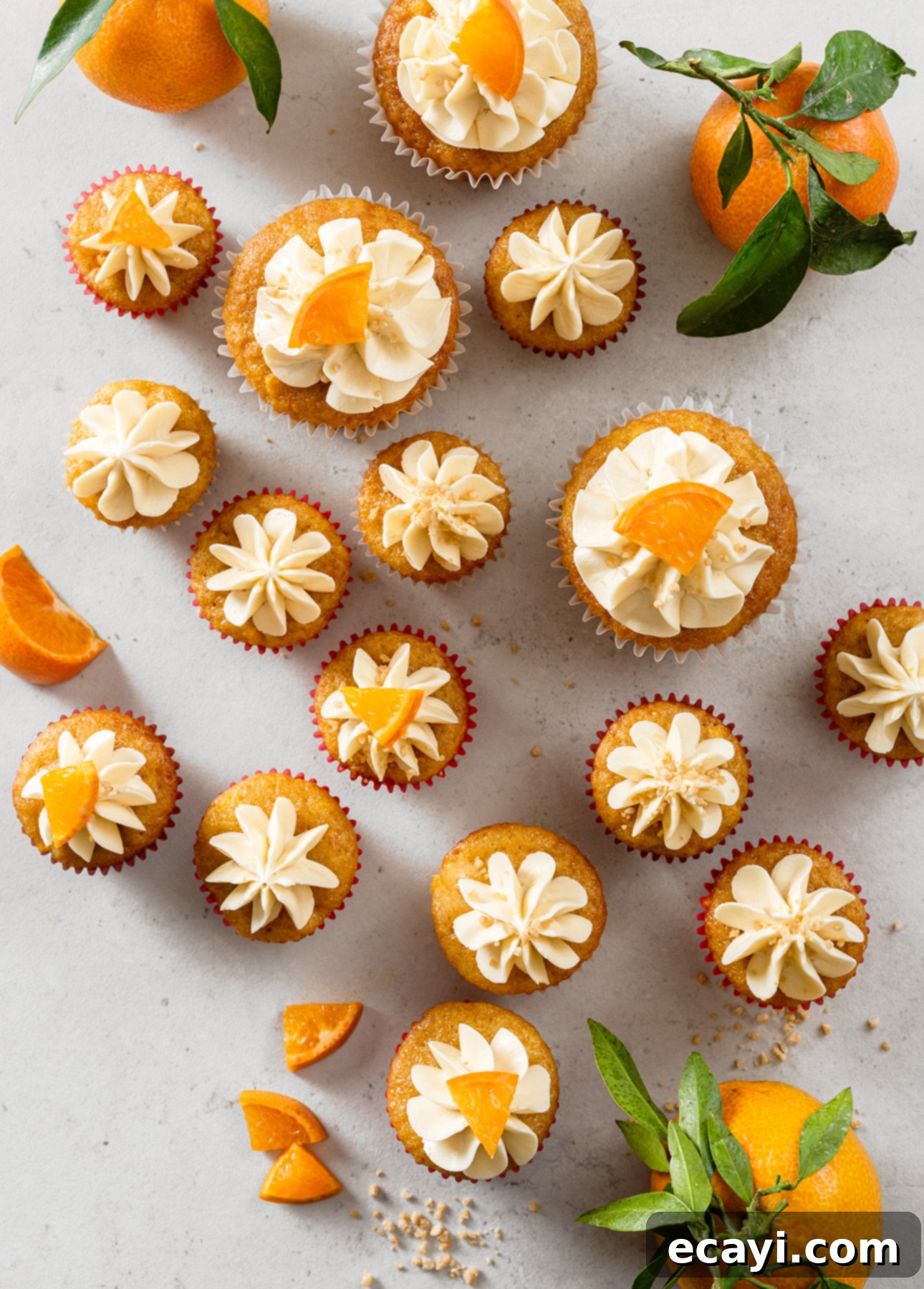 Zesty Clementine Squash Cupcakes, Topped with Dreamy Maple Meringue 3 Clementine Squash Cupcakes with Maple Italian Meringue Buttercream // FoodNouveau.com