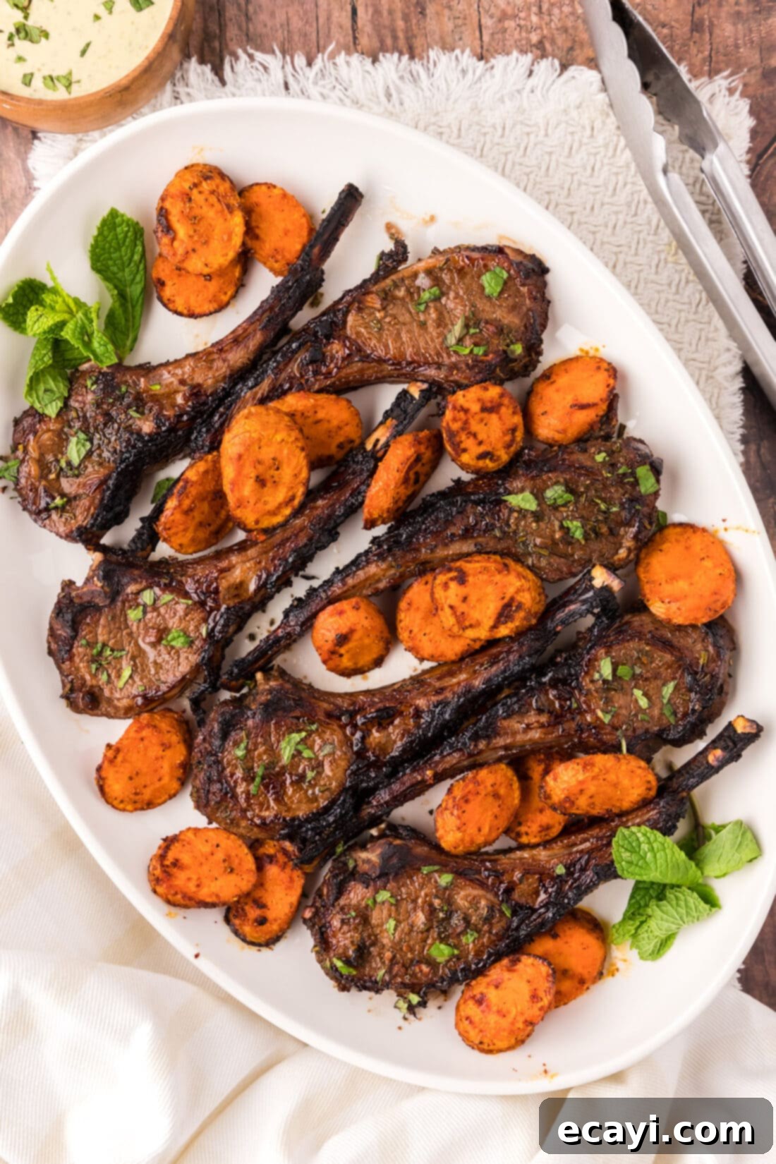 Succulent Broiled Lamb Chops 3 Platter of Broiled Lamb Chops with carrots