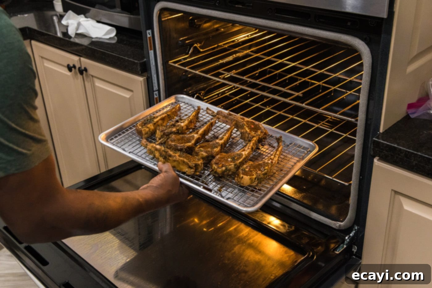 Succulent Broiled Lamb Chops 6 placing baking sheet with lamb chops under the broiler