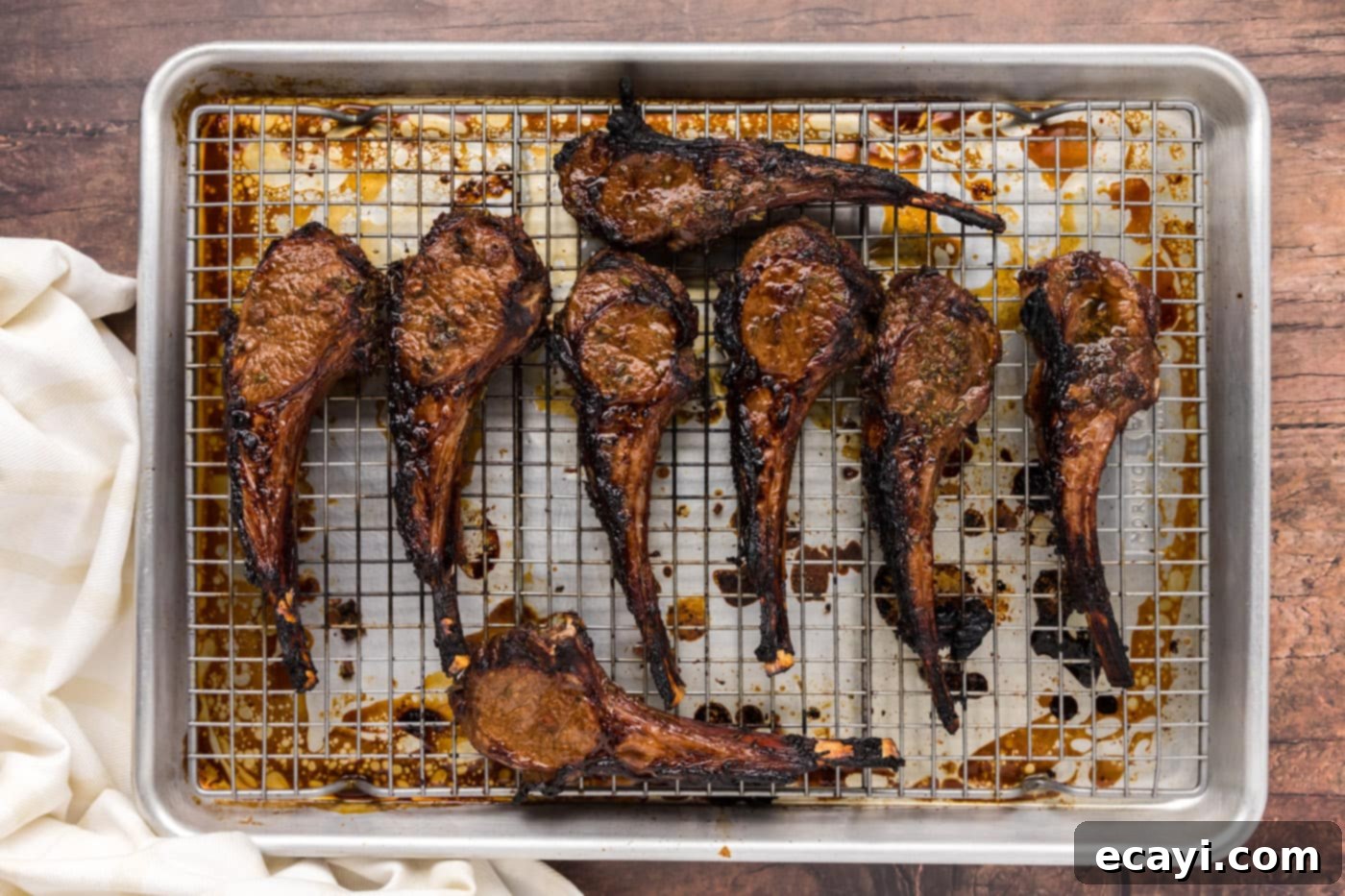 Succulent Broiled Lamb Chops 7 broiled lamb chops on a baking sheet