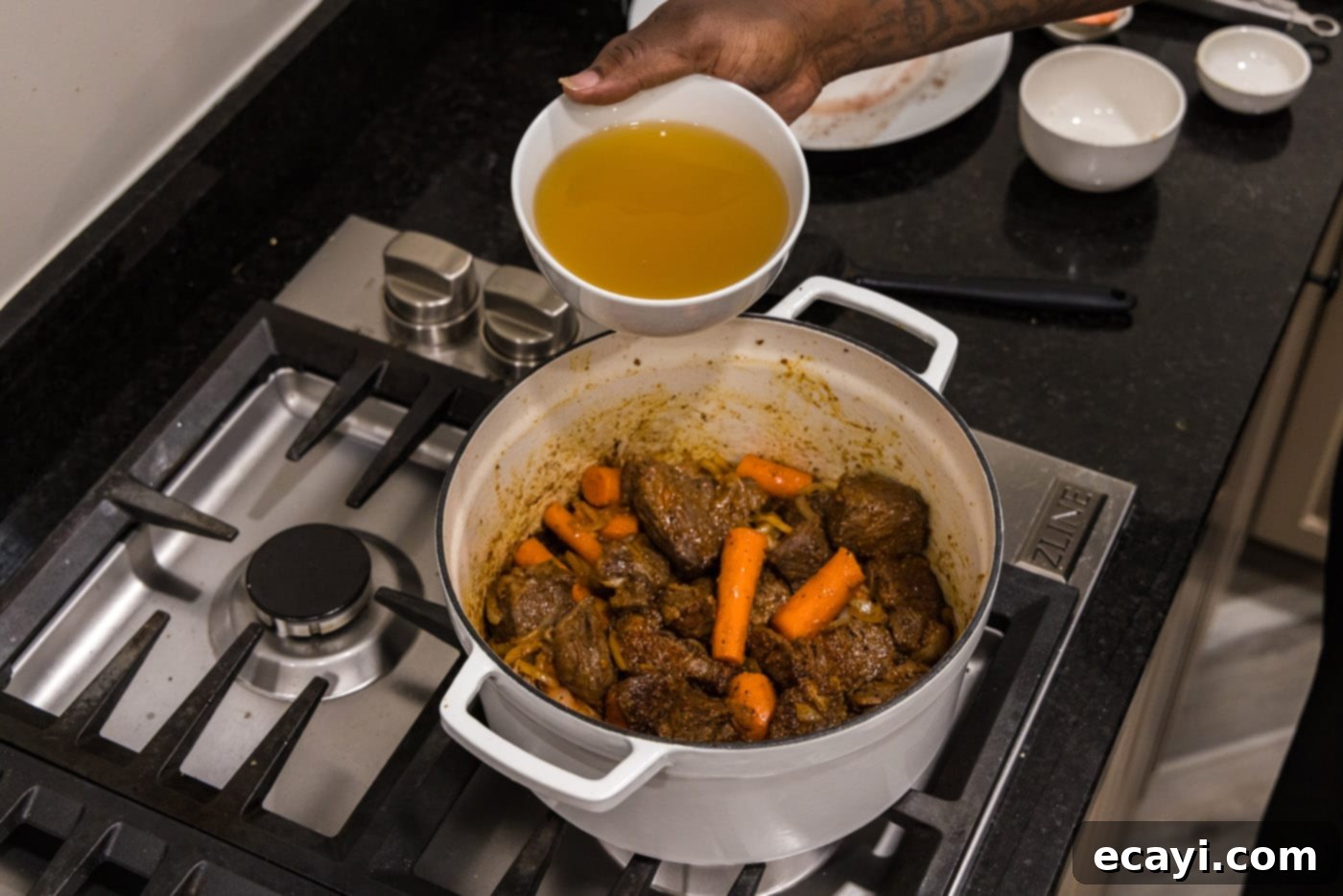 Savory Slow-Braised Beef 12 adding chicken stock to braised beef