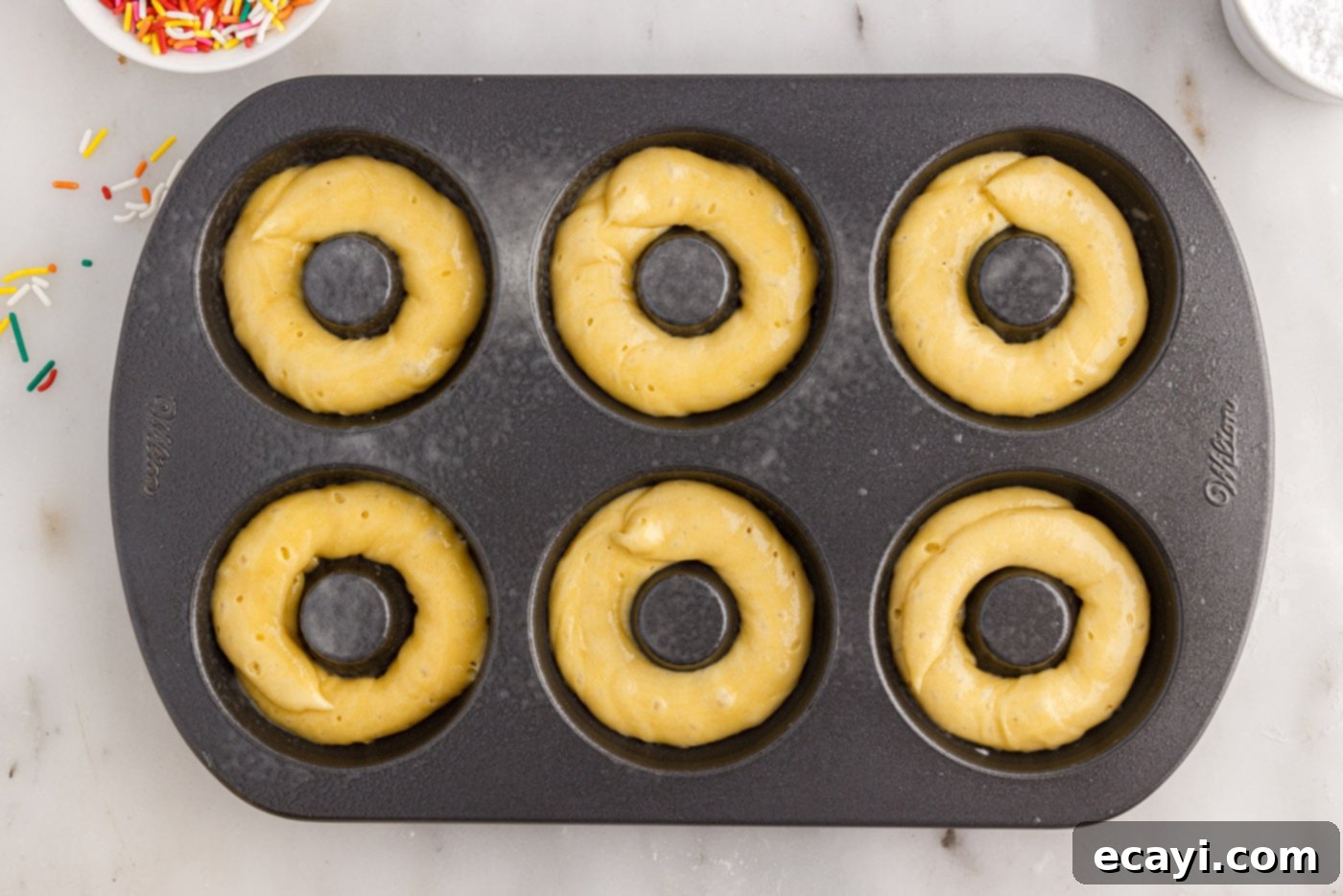 Effortless Cake Mix Donuts 8 donut batter in a pan