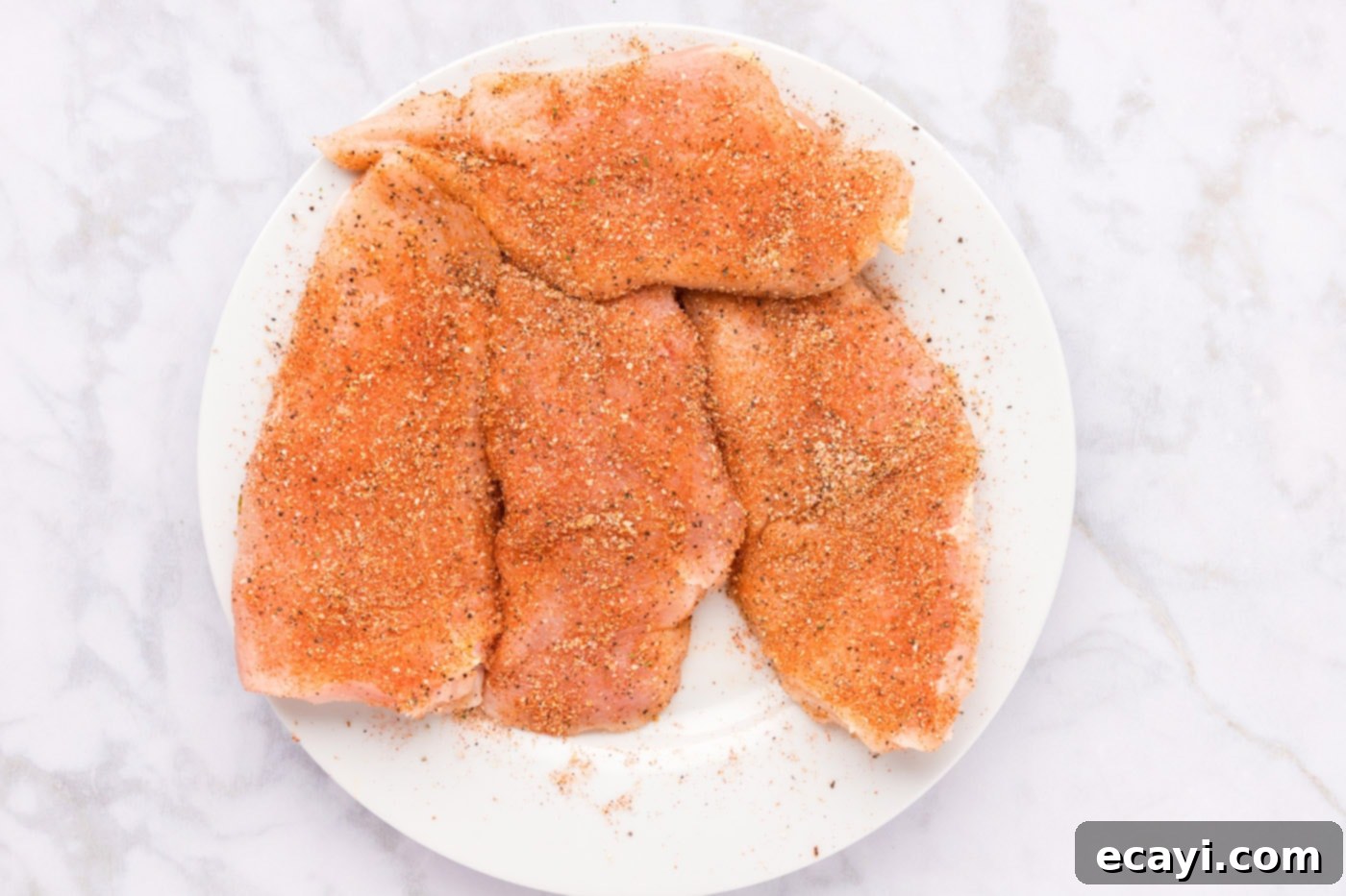 Cajun Spiced Blackened Chicken 6 Chicken breasts thoroughly coated with the vibrant blackened seasoning blend.