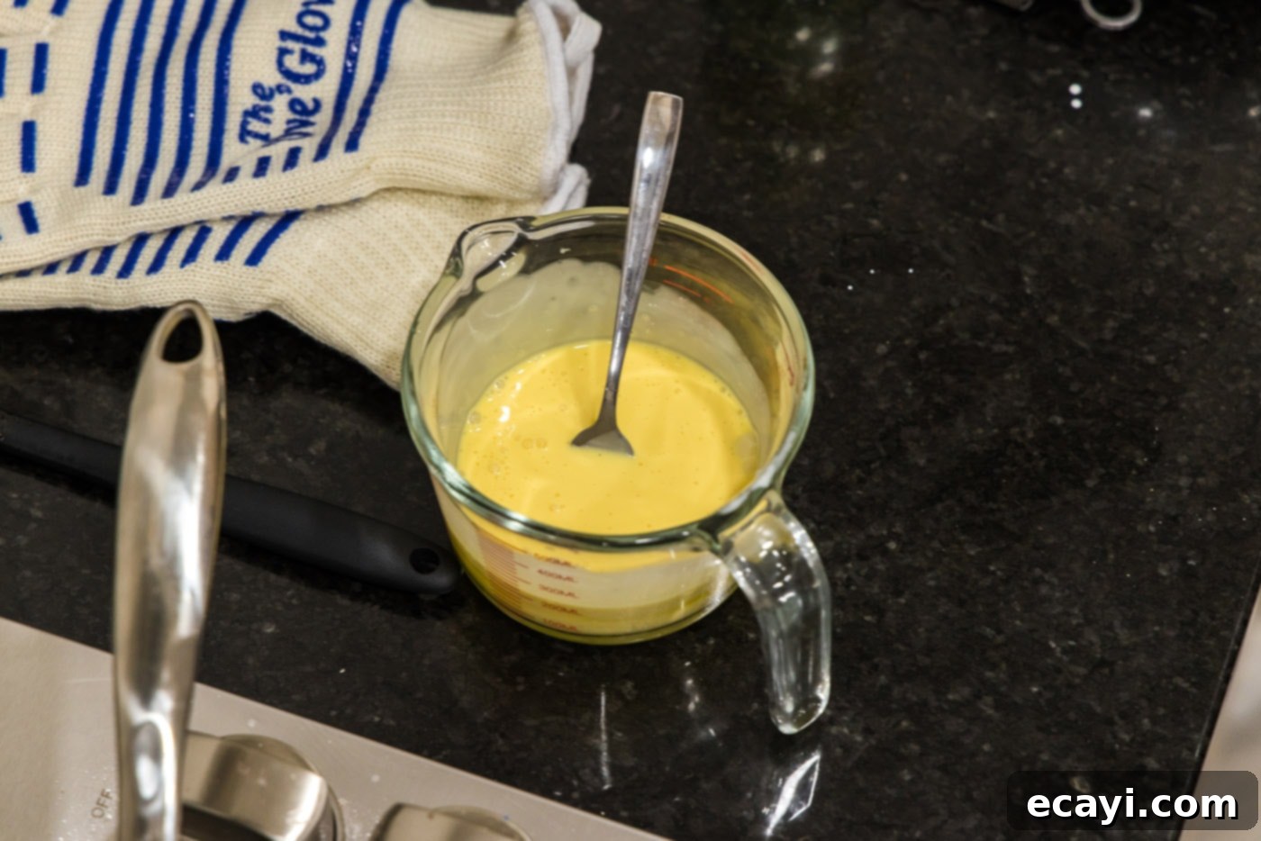 Velvet Lobster Delight 6 Whisked heavy cream and egg yolks in a measuring cup, ready for tempering.