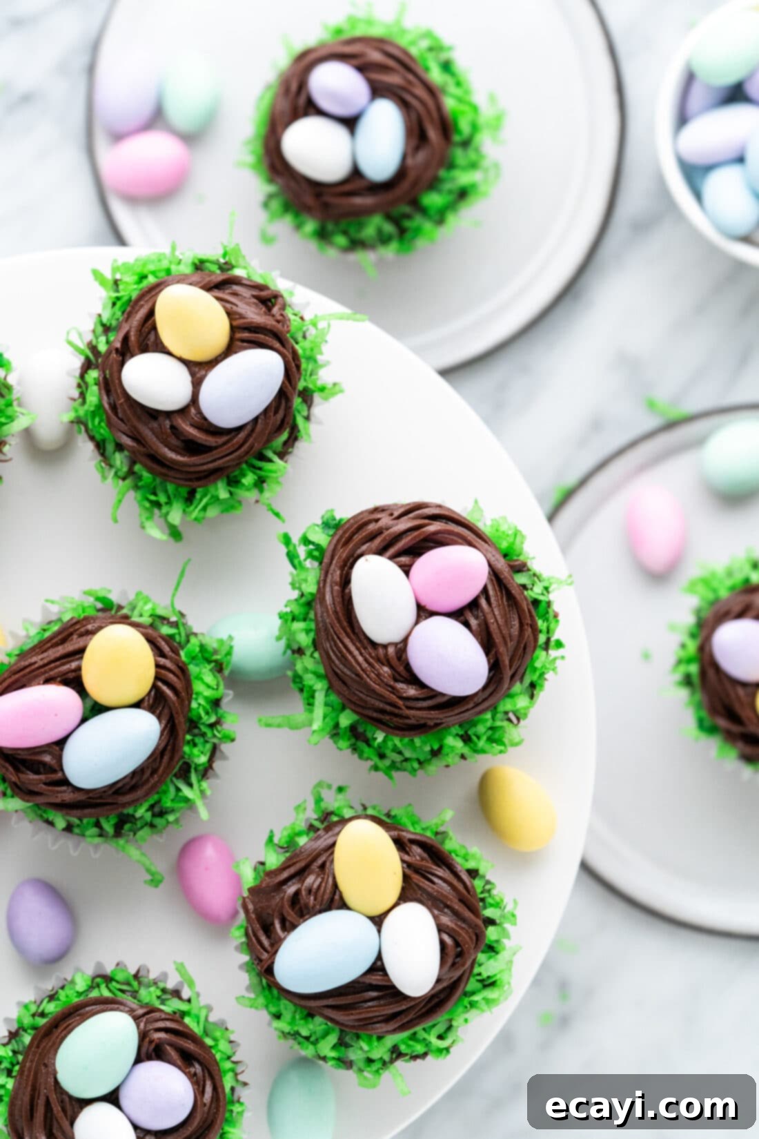Springtime Nest Delights 14 Easter Nest Cupcakes on a white cake stand
