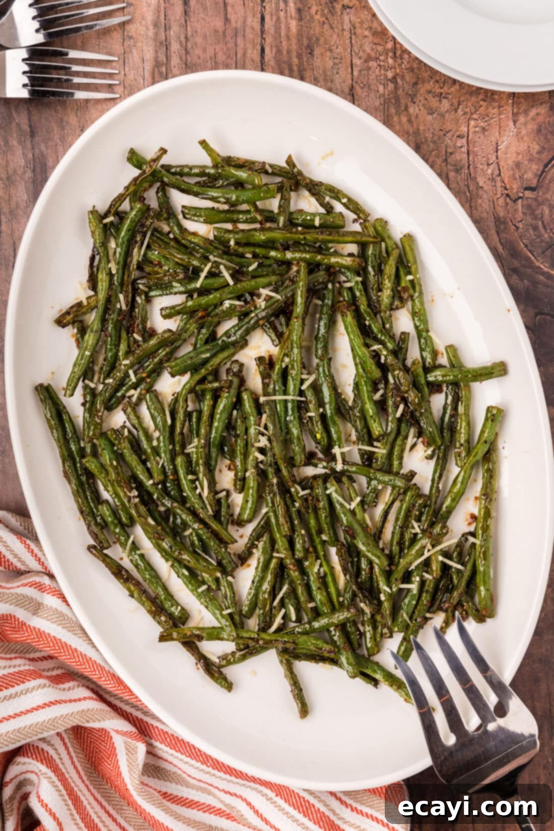 Crispy Roasted Green Beans 11 Roasted Green Beans on a white serving platter, ready to enjoy