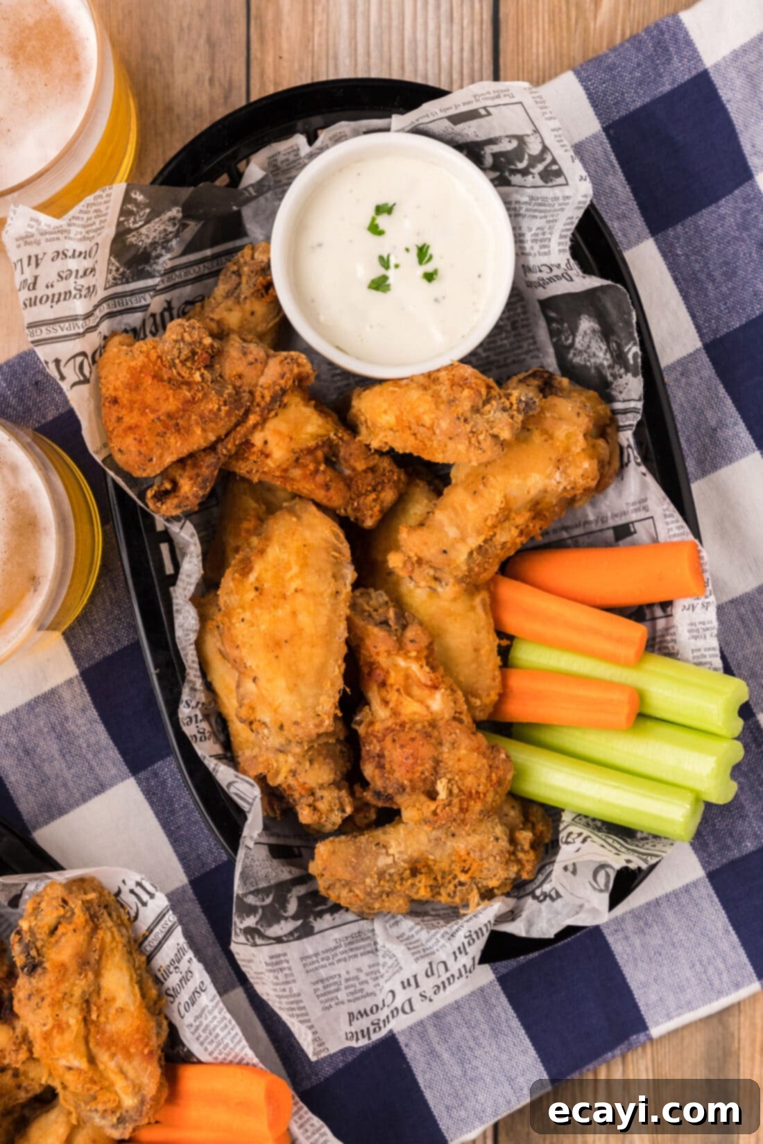 Crispy Fried Chicken Wings 13 Basket of Golden Fried Chicken Wings, perfectly crisp and ready to eat.