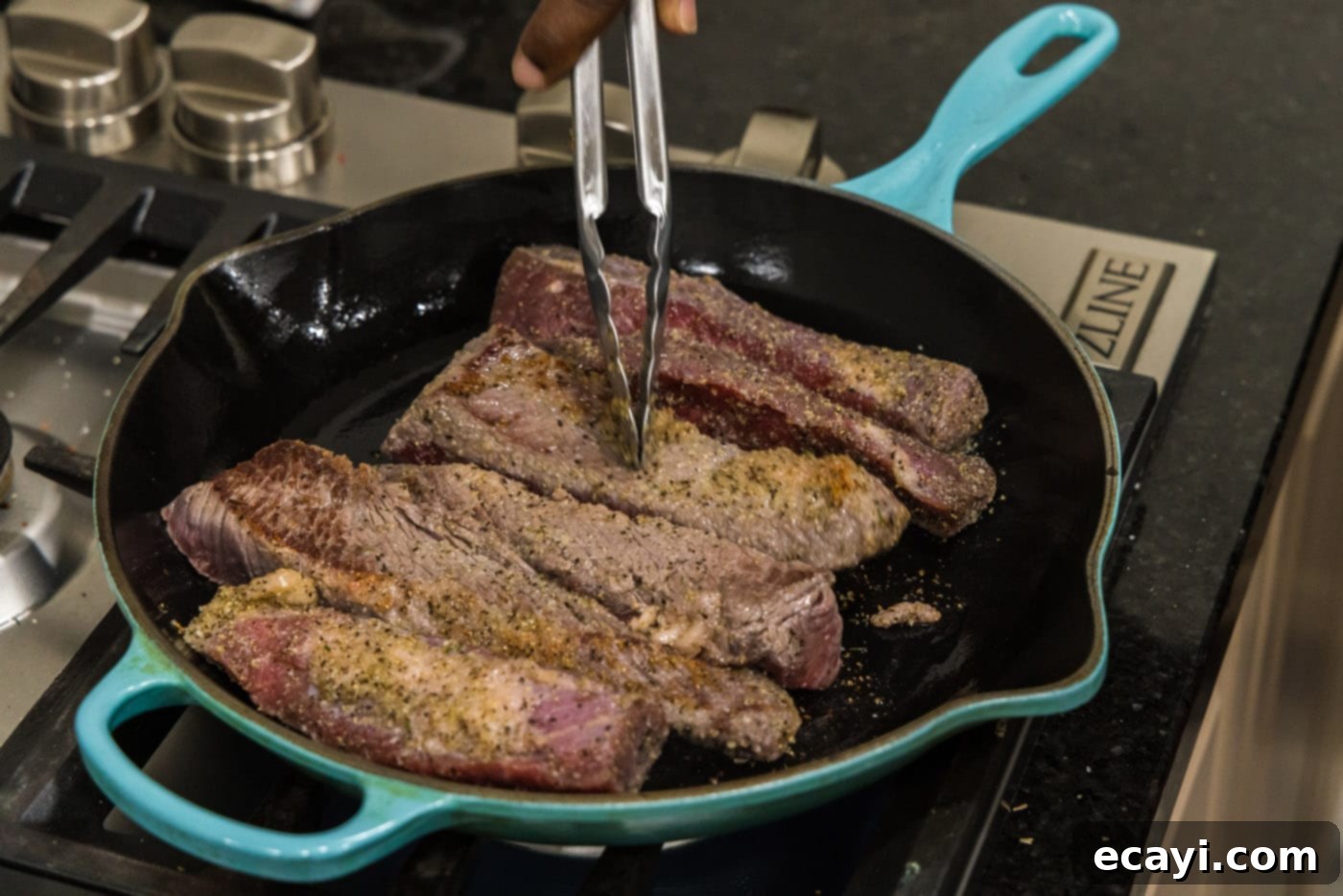 Tender Boneless Beef Short Ribs 7 Searing boneless beef short ribs in a hot skillet, achieving a beautiful brown crust on the meat.