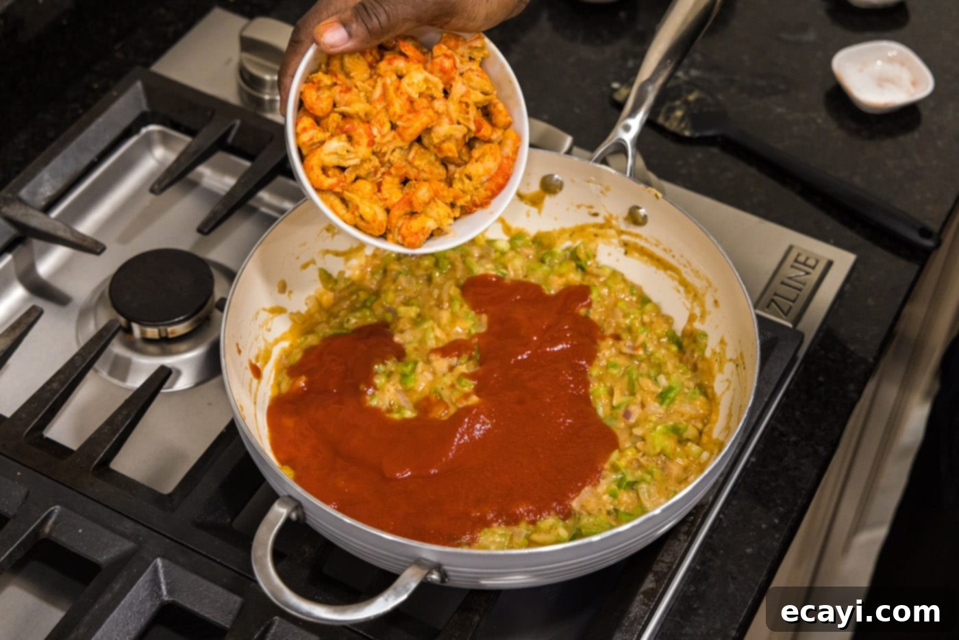 Crawfish Etouffee: A Taste of Louisiana 12 adding crawfish to skillet for crawfish etouffee