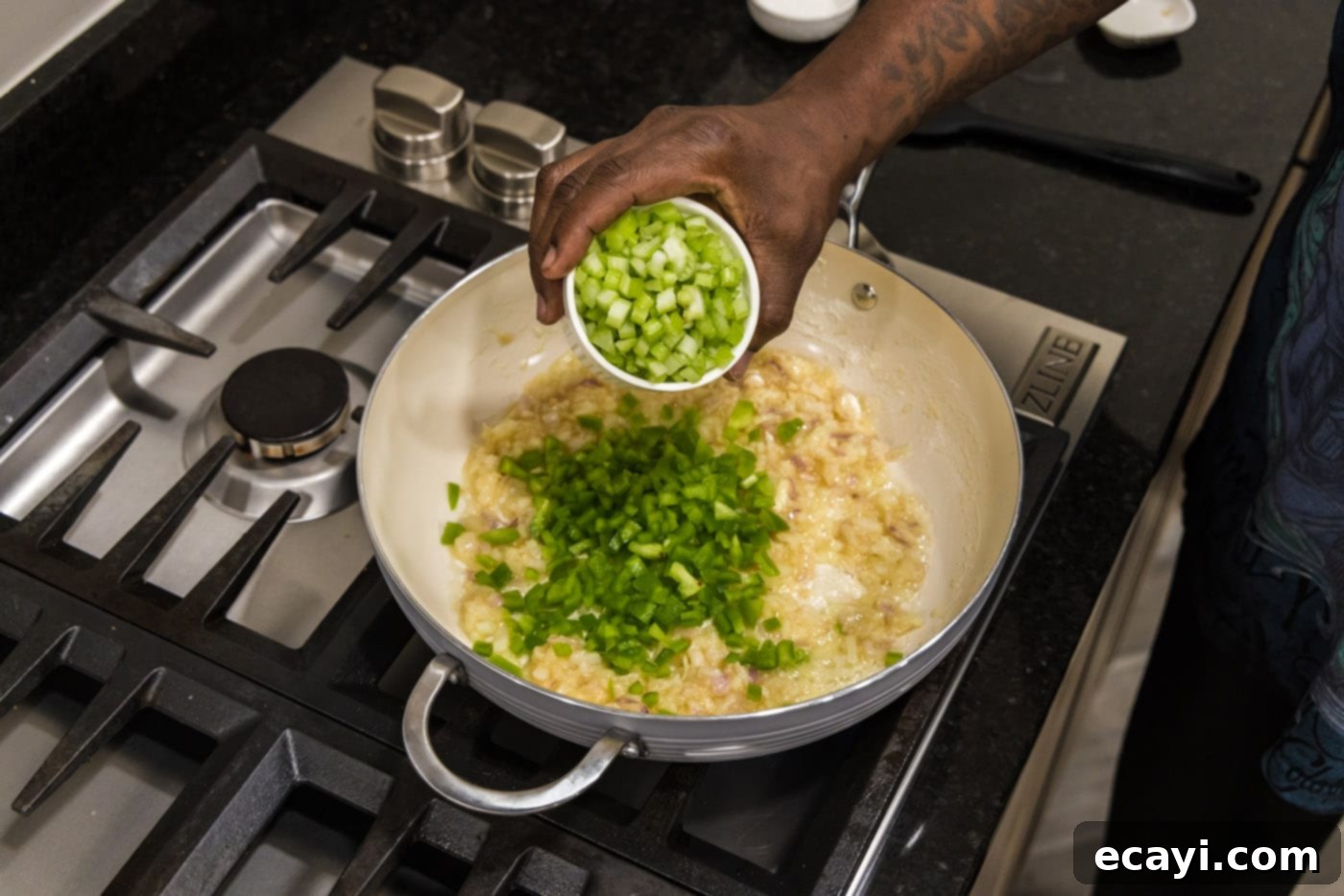 Crawfish Etouffee: A Taste of Louisiana 8 adding celery to roux