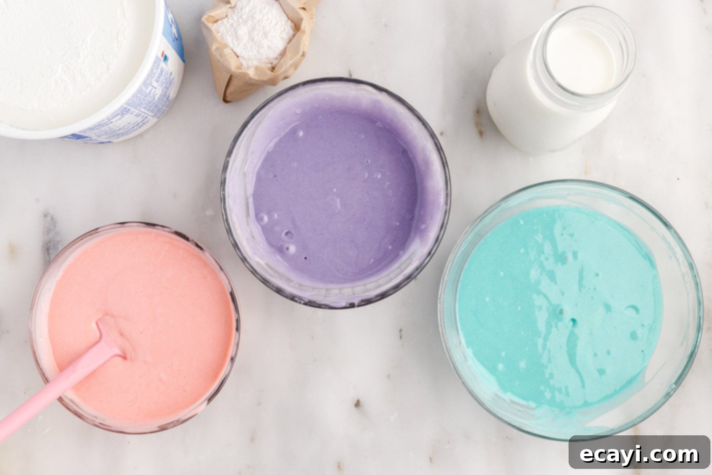 Springtime Poke Cake Delight 8 pastel pink, purple, and blue cake batter