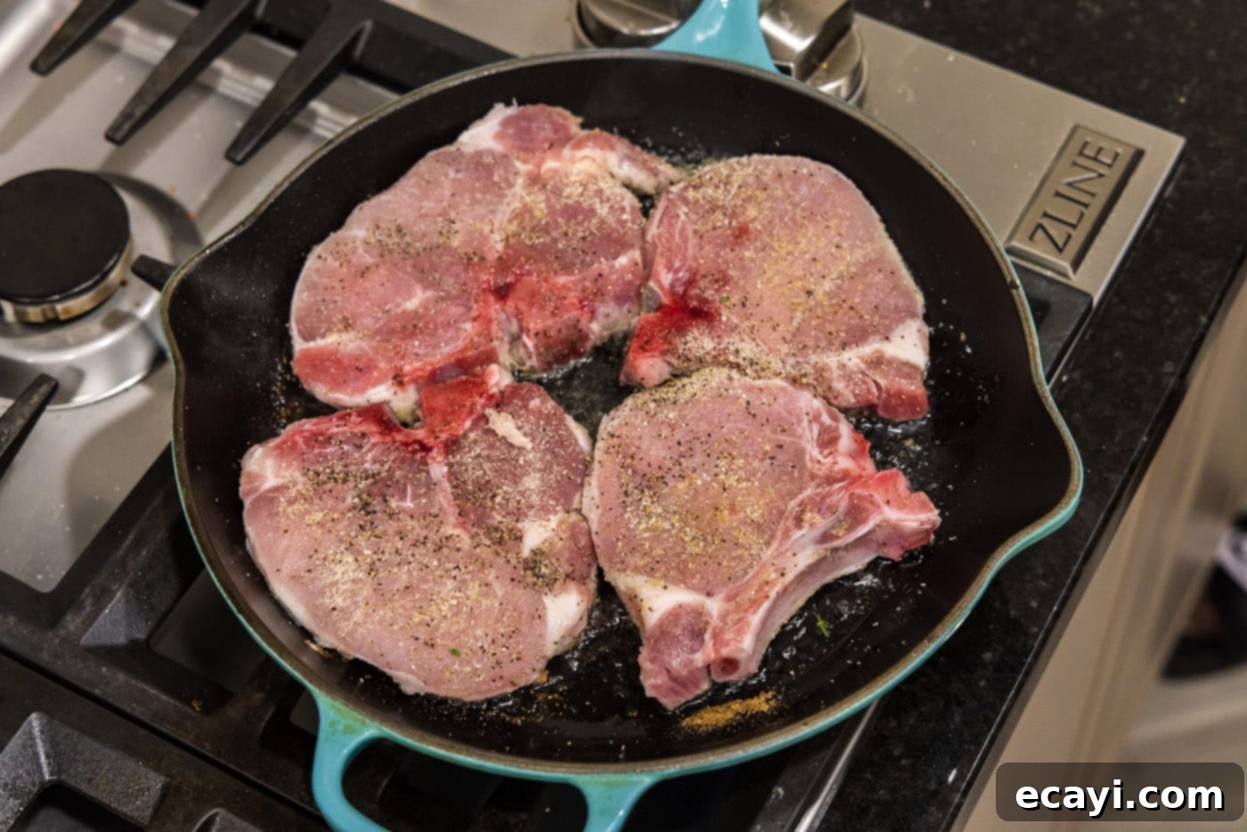 Fall-Off-The-Bone Pork Chops 6 Searing seasoned pork chops in a hot skillet until golden brown