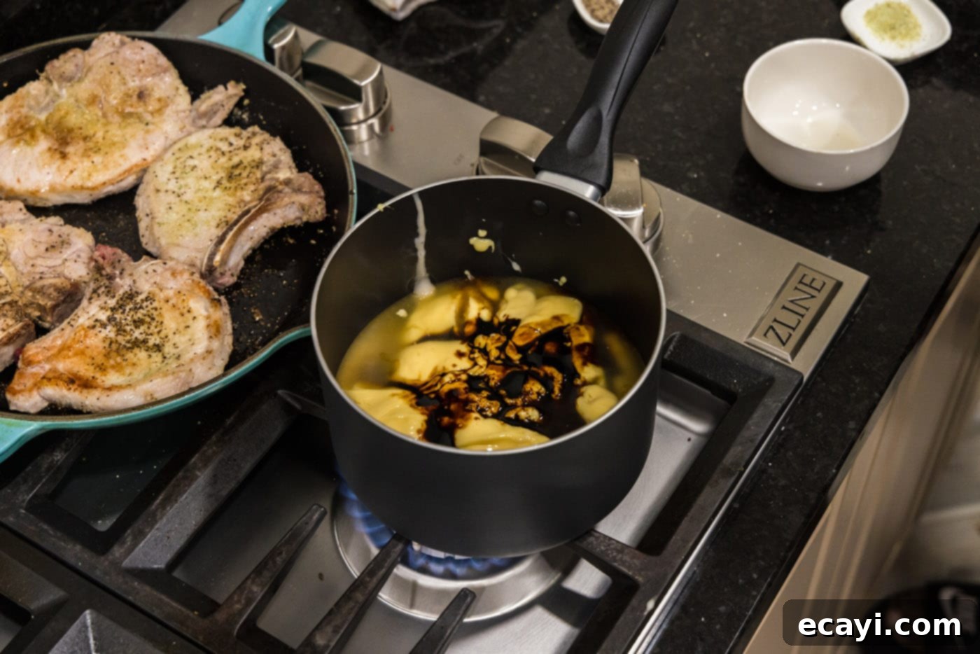 Fall-Off-The-Bone Pork Chops 8 Ingredients for brown gravy being combined in a saucepan for pork chops