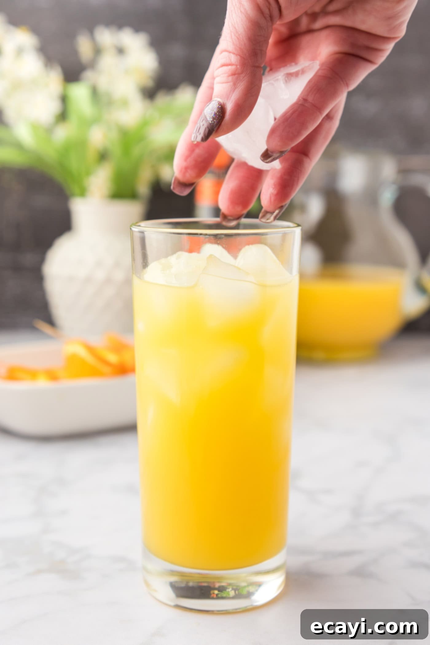 Golden Peach Nectar 8 adding ice to fuzzy navel cocktail