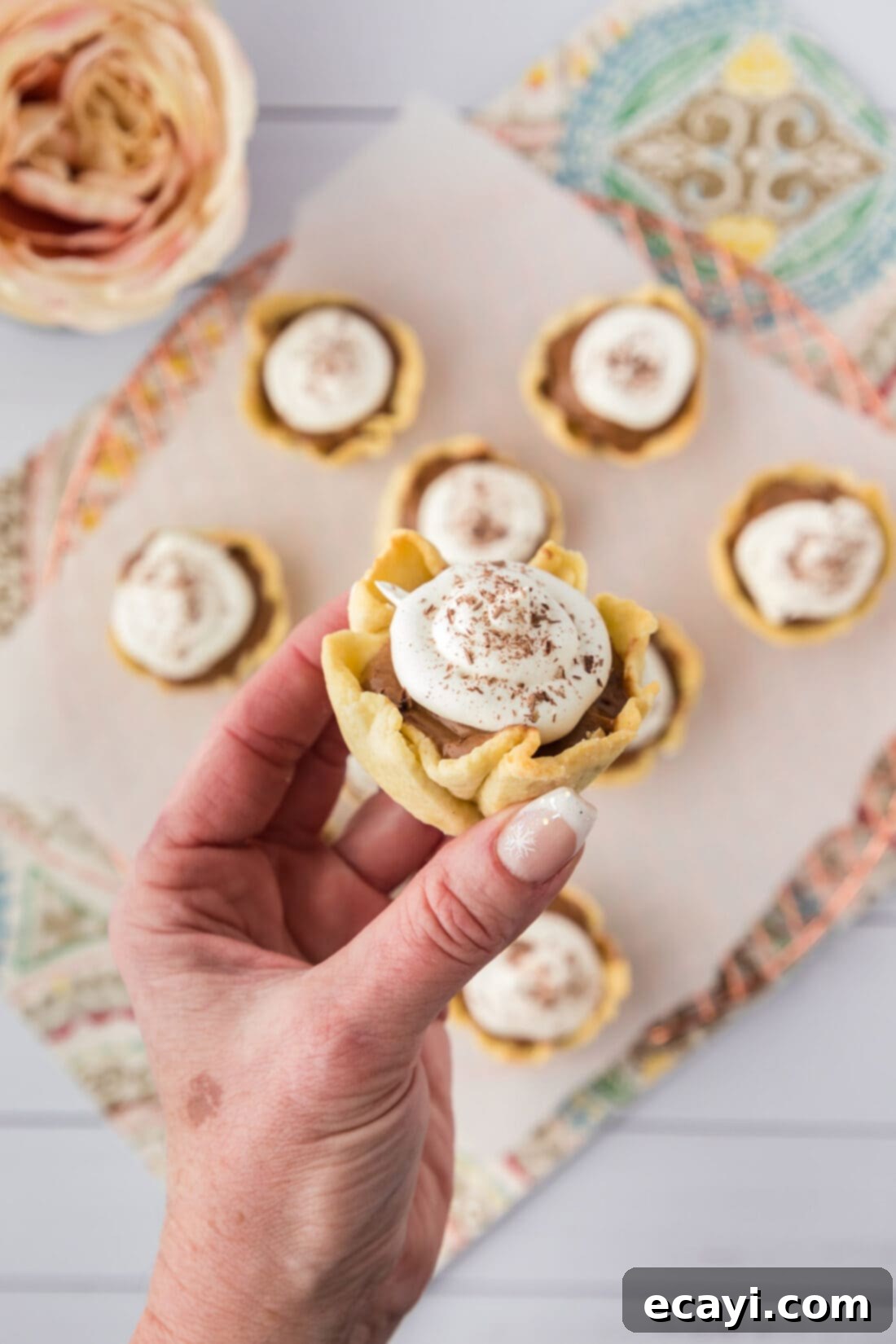 Petite French Silk Pies 2 Hand holding a Mini French Silk Pie