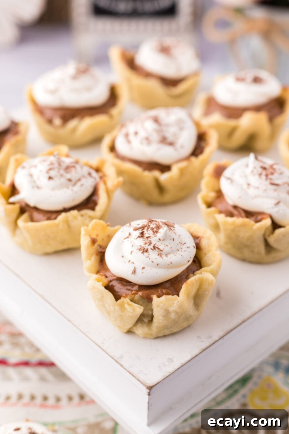 Petite French Silk Pies 3 Mini French Silk Pies on a cake stand