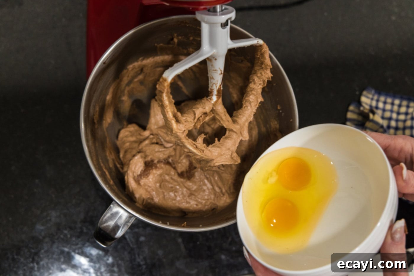 Petite French Silk Pies 23 adding eggs to french silk pie filling