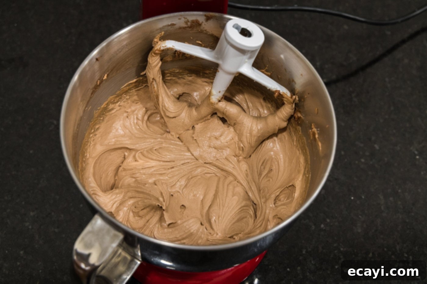 Petite French Silk Pies 24 finished french silk pie filling in a mixing bowl with beater