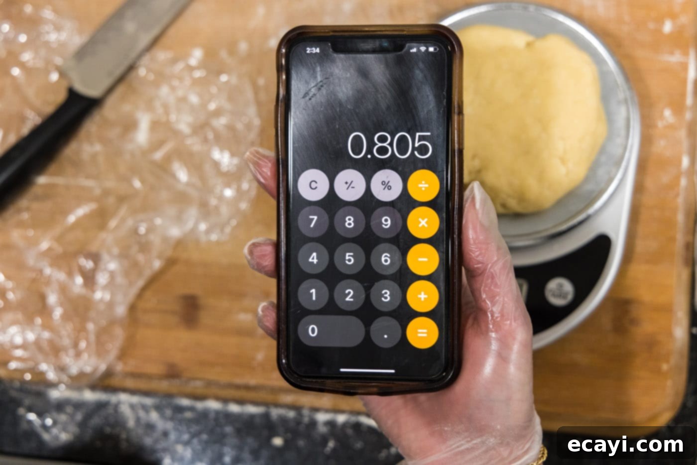 Petite French Silk Pies 6 dough on a scale with phone calculator showing weight
