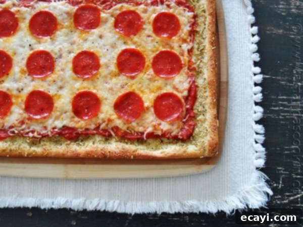Classic Pizza with Garlic Bread Crust 3 An overhead photo of garlic bread crusted classic pizza.