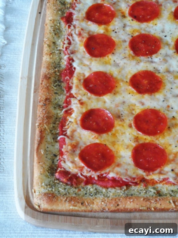 Classic Pizza with Garlic Bread Crust 4 A close up photo of garlic bread crusted classic pizza.