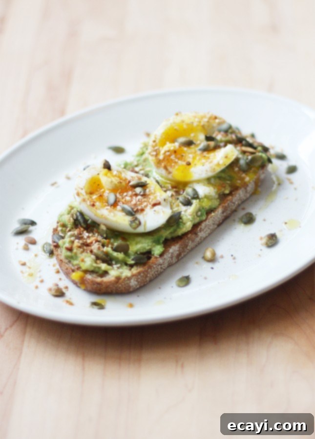 Golden Yolk Avocado Toast 2 Soft-Boiled Egg and Smashed Avocado Toast // FoodNouveau.com