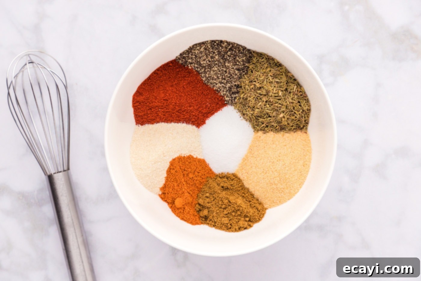 Spicy Louisiana Blend 5 Cajun seasoning ingredients freshly combined in a mixing bowl.