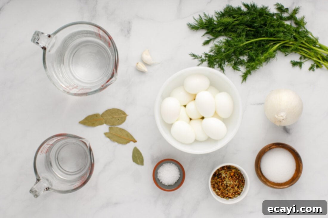 Perfectly Pickled Eggs 4 A collection of ingredients laid out on a wooden surface: hard-boiled eggs, fresh dill, garlic, bay leaves, vinegar, water, salt, sugar, sliced onion, and pickling spices.