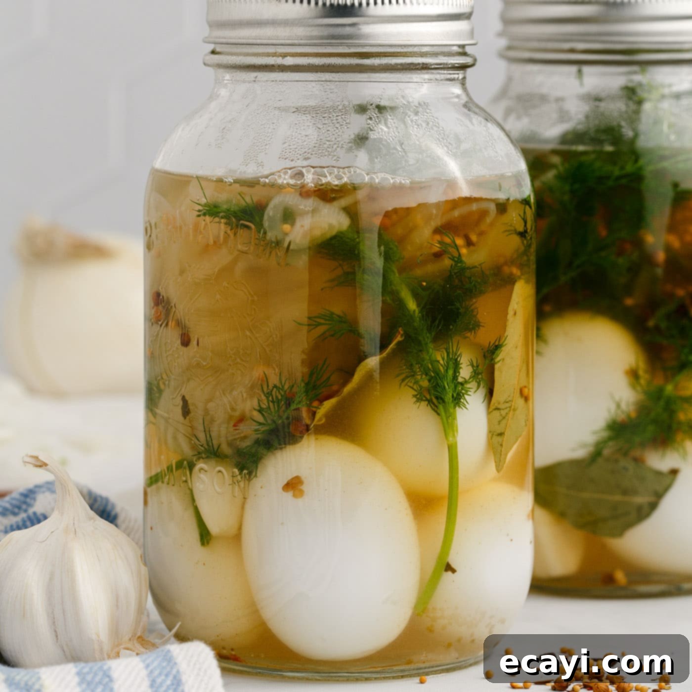 Perfectly Pickled Eggs 10 A sealed mason jar filled with pickled eggs, ready to be refrigerated and left to infuse with flavor.
