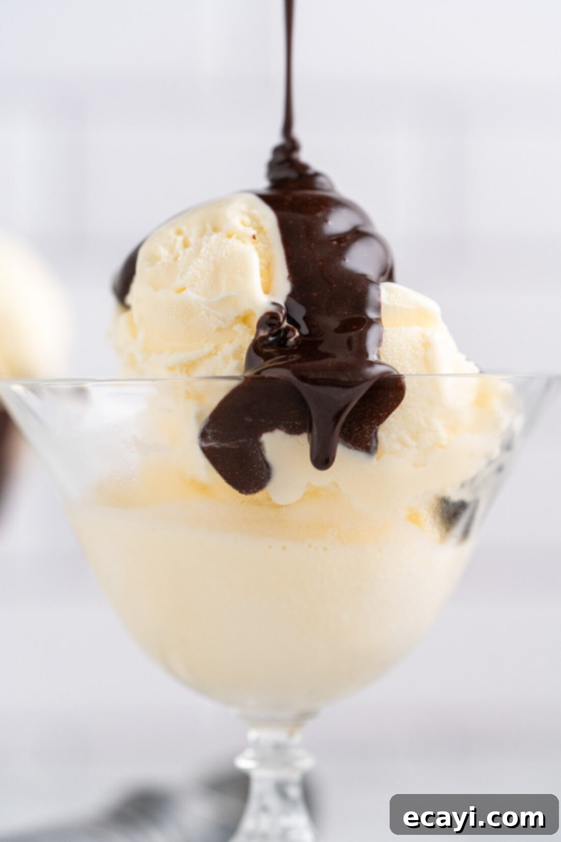 Decadent Chocolate Drizzle 12 Hot Fudge being drizzled over ice cream