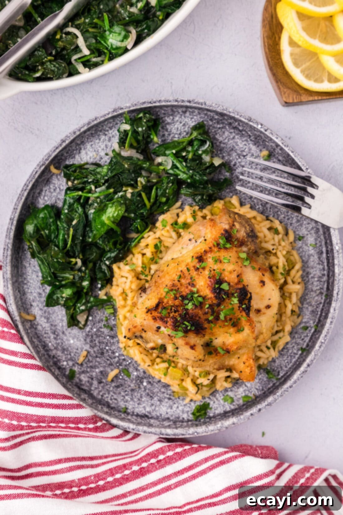 Effortless Instant Pot Chicken Thighs 2 Instant Pot Chicken Thigh on a plate with sautéed spinach