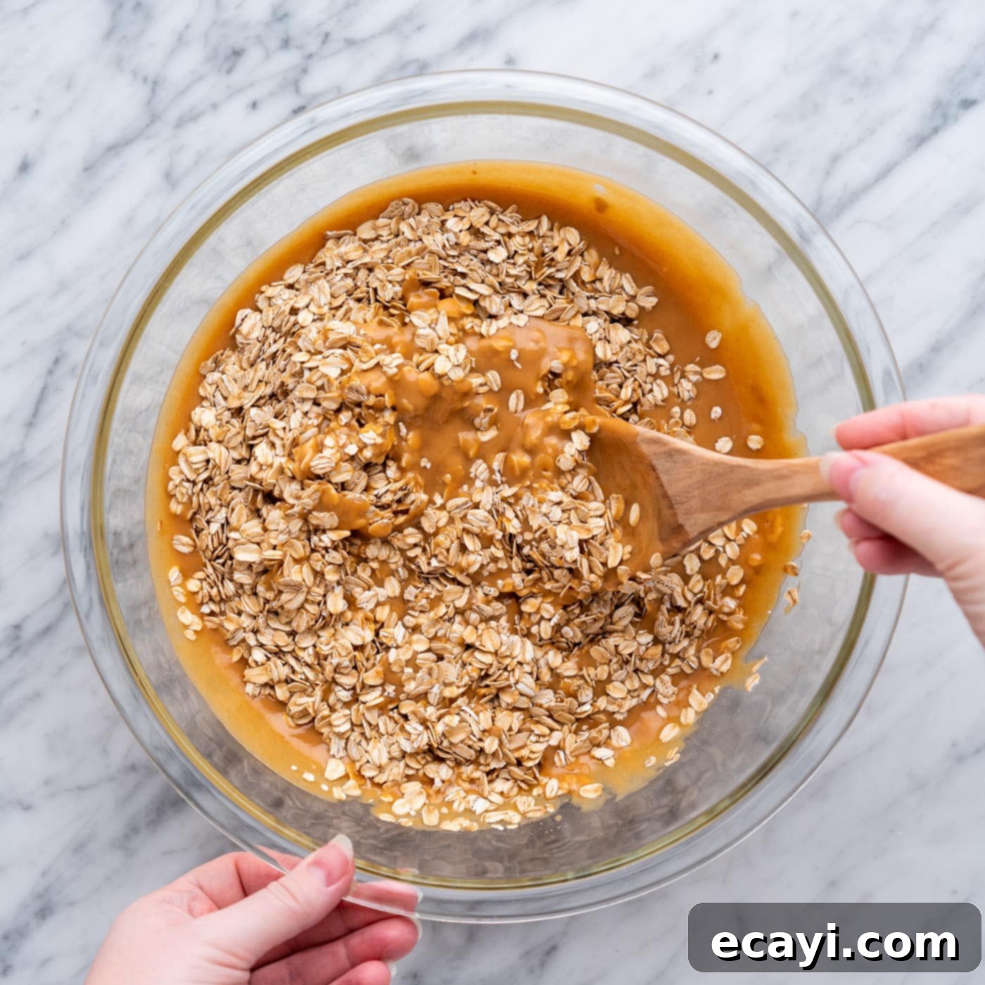 Peanut Butter Bliss Bites 11 Stirring old-fashioned oats into the warm peanut butter mixture