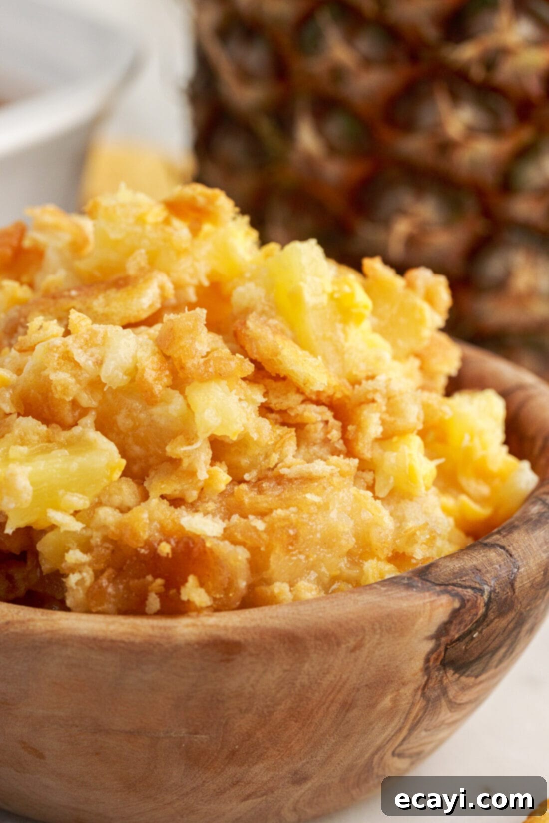 Sweet Pineapple Bake 3 Bowl of Southern Pineapple Casserole Ready to Serve