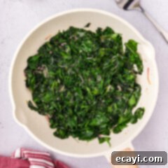 Garlic Spinach Sauté 10 Overhead photo of Sautéed Spinach in a skillet