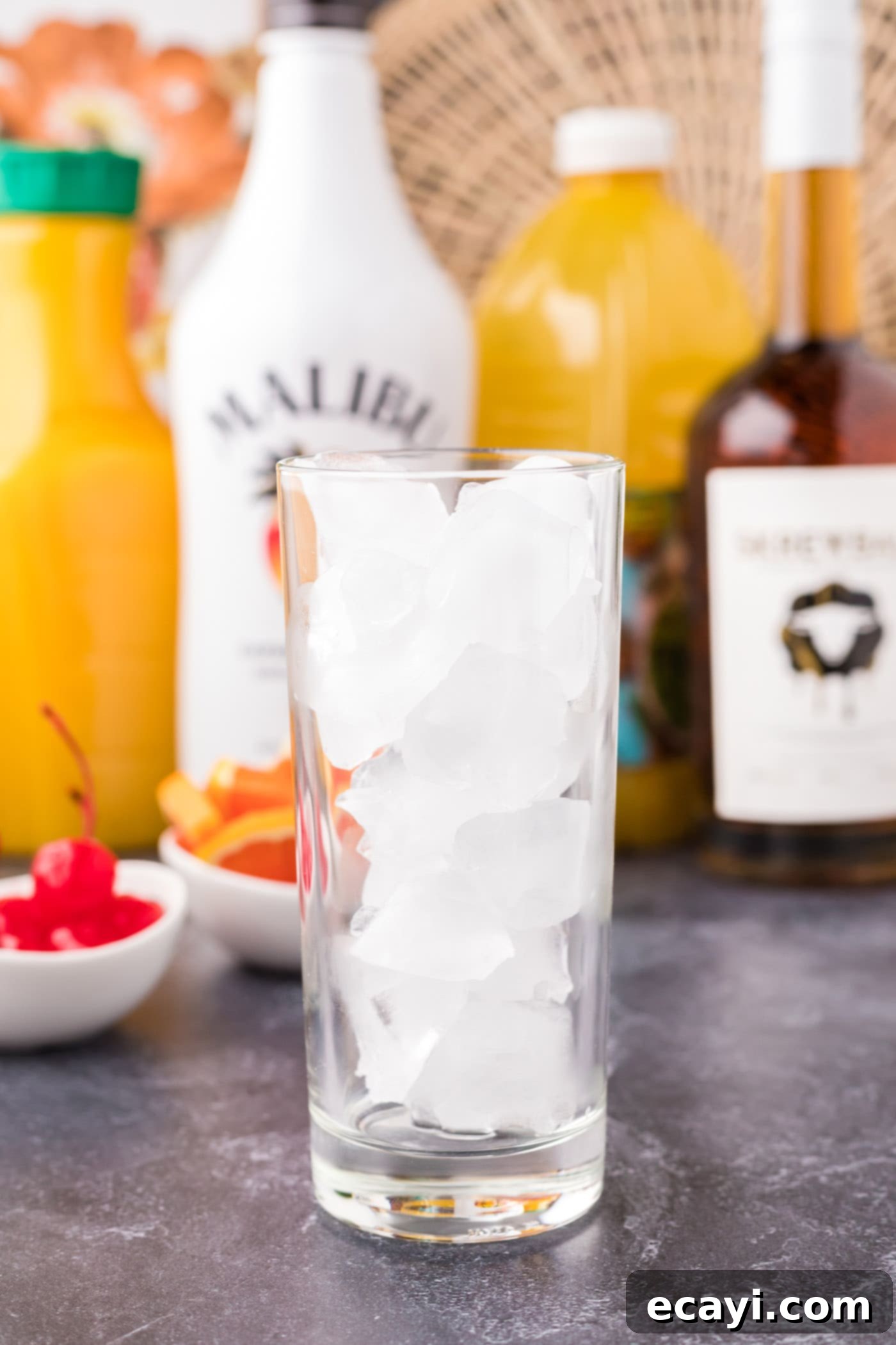 The Unhinged Sip 5 highball glass filled with ice