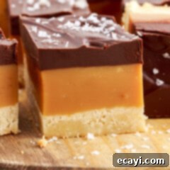 Golden Caramel Indulgence 19 Close up photo of a Millionaire’s Bar showing its layers.