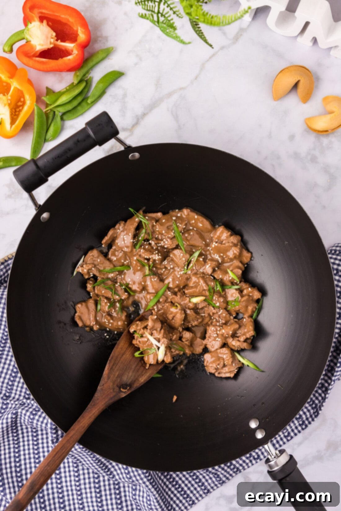 Savory Teriyaki Beef 10 A wok of Beef Teriyaki with a spoon